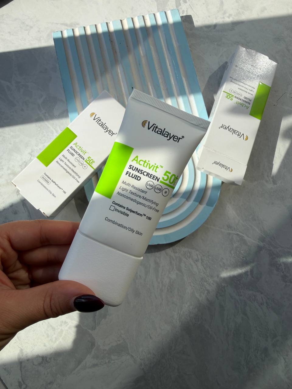 ضد آفتاب فلوییدی ویتالایر مدل اکتی ویت مخصوص پوست چرب و مختلط SPF50